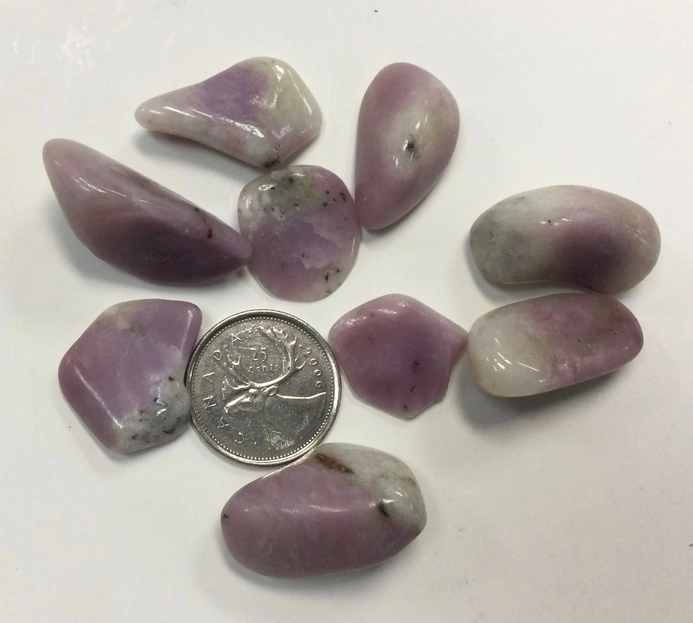 Lavender thulite, tumbled