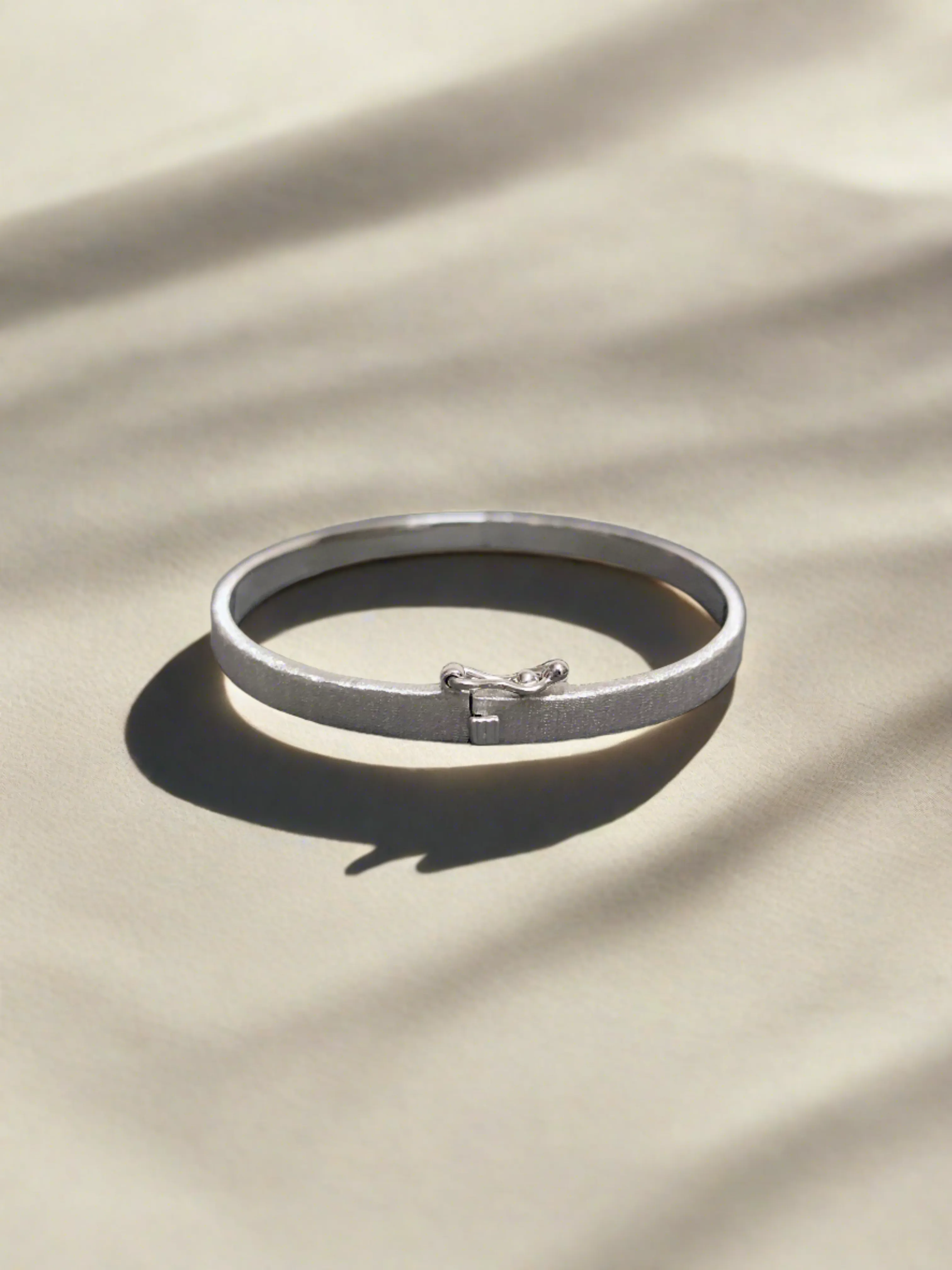 Rhodium Brushed Bangle